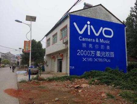 龙港刷墙广告和喷绘墙体广告哪个效果好？